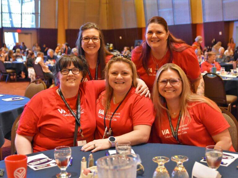 A group of women veterans at a conference table.